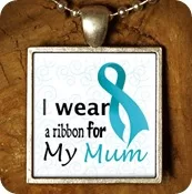 Image of a pendant. I wear a ribbon for my Mum with a teal ribbon.